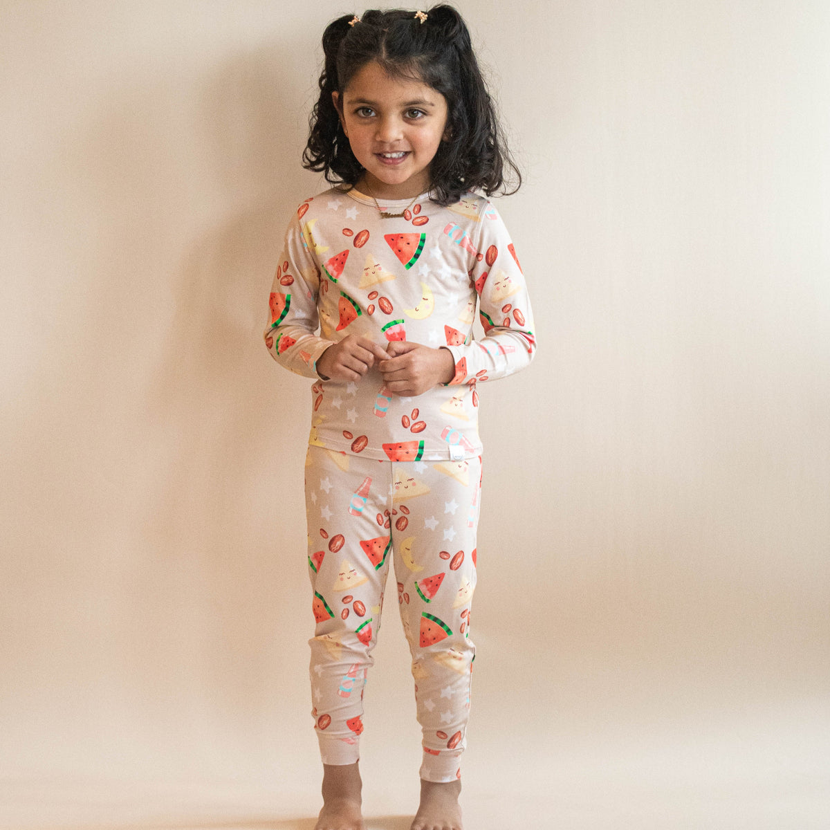 Taller girl model is wearing size 4T and is 43" tall.